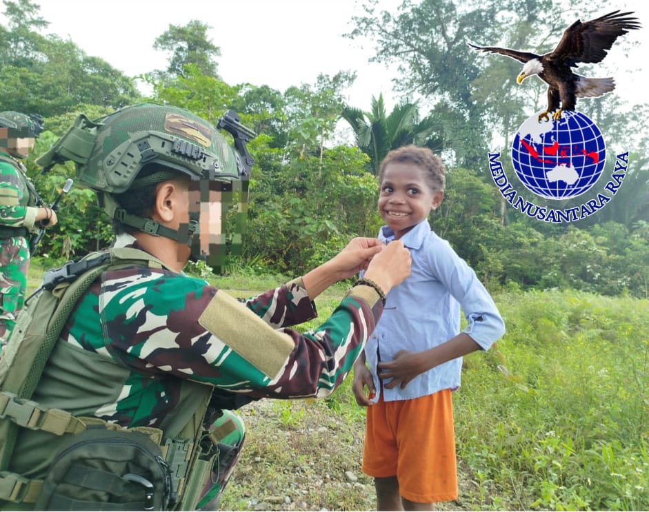 Kepedulian Marinir Habema Bagi Baju Gratis Untuk Warga Maruku