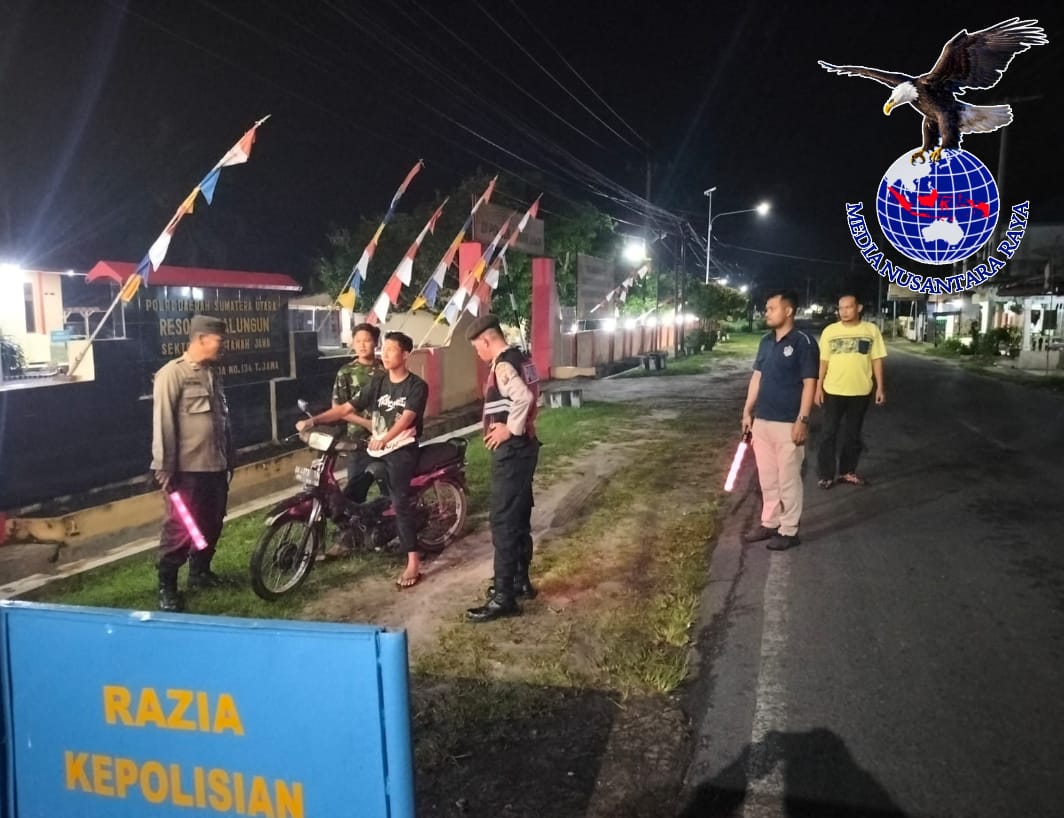 Razia Skala Besar Polsek Tanah Jawa Berhasil Menangani Ancaman Keamanan di Tengah Gerimis