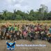 Dukung Program Ketahanan Pangan Pemerintah, Satgas Yonif 131/Brajasakti Bersama Masyarakat Kampung Wonorejo Perbatasan Papua Panen Jagung