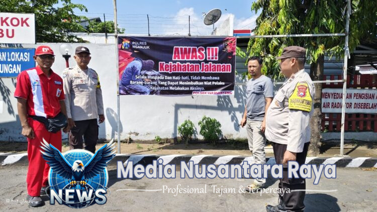 Cegah Aksi Premanisme, Polres Nganjuk Pasang Banner Imbauan di Titik Strategis 