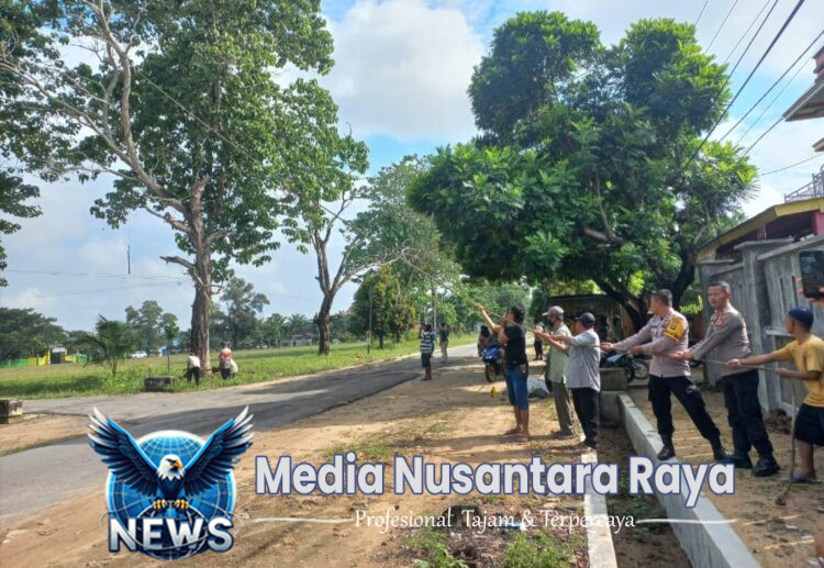Polsek Seputih Surabaya Bersama Warga Tebang Pohon Mati Demi Keselamatan Bentuk Nyata Kepedulian dan Sinergitas