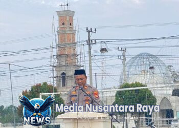 Kapolsek Lambu Kibang Menjadi Khatib Sholat Idul Adha 1446 H / 2025 di Lapangan Merdeka