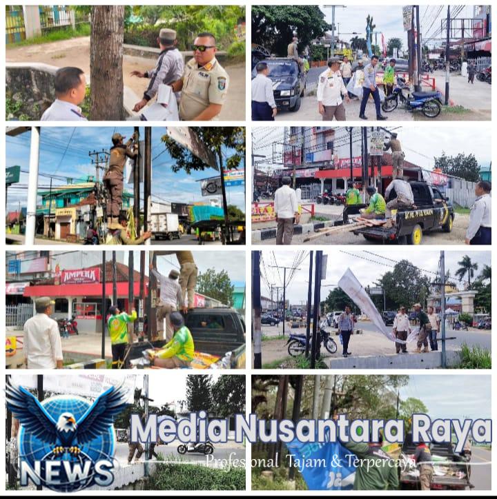 Satuan Polisi Pamong Praja (Satpol PP) Kabupaten Pringsewu Menertibkan Banner Dan Spanduk