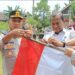 Tebarkan Semangat Nasionalisme Kapolres Mesuji Bagikan Bendera Merah Putih Jelang HUT RI ke-80