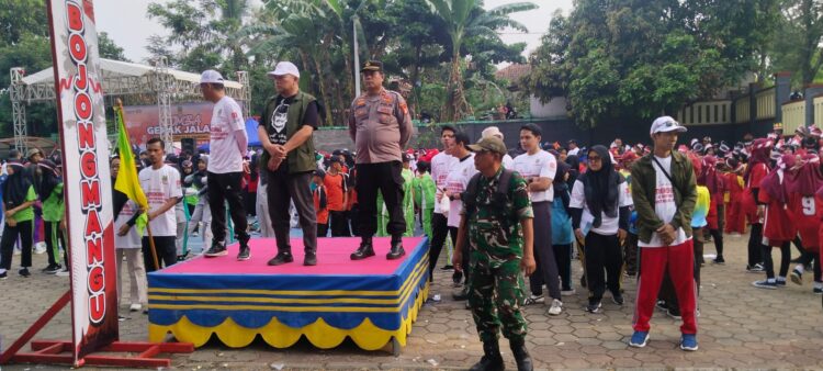Polsek Cibarusah Pastikan Keamanan Lomba Gerak Jalan HUT ke-80 RI