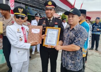 Camat Baamang Jadi Inspektur Upacara HUT RI yang ke-80 di SMPN 9 Baamang Hulu Sampit