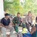 Perkuat Sinergi, Babinsa dan Bhabinkamtibmas Gelar Komsos Bersama Warga Desa Sungai Bulian