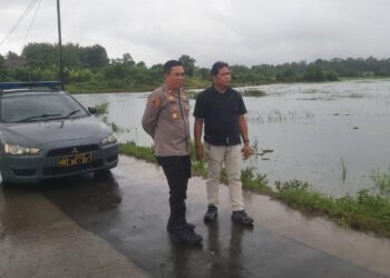 Kapolsek Panongan Cek Langsung Daerah Rawan Banjir, Pastikan Kondisi Masih Terkendali