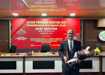 Di Balik Seragam Polisi, Ipda Acep Sukses Raih Gelar Doktor dengan Predikat Summa Cum Laude