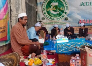 Indahnya Berbagi, Majlis Dzikir Nurul Qolby Sukses Gelar Santunan Anak Yatim dan Dhuafa di Serang Baru   