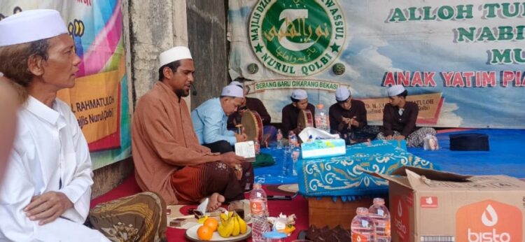 Indahnya Berbagi, Majlis Dzikir Nurul Qolby Sukses Gelar Santunan Anak Yatim dan Dhuafa di Serang Baru