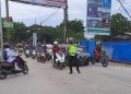 Polsek Babelan Atur Arus Pulang Kerja di Perempatan Warung Gabus Pucung