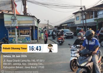 Polsek Cikarang Timur Hadirkan Kelancaran Arus Sore di Pertigaan Graha Asri