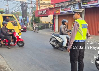 Jaga Jakarta Jaga Bekasi, Polsek Setu Atur Arus Pagi di Pertigaan KUD Ciledug