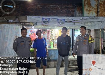 Jaga Jakarta Jaga Bekasi, Bhabinkamtibmas Kelurahan Bahagia Dorong Warga Aktifkan Kembali Poskamling