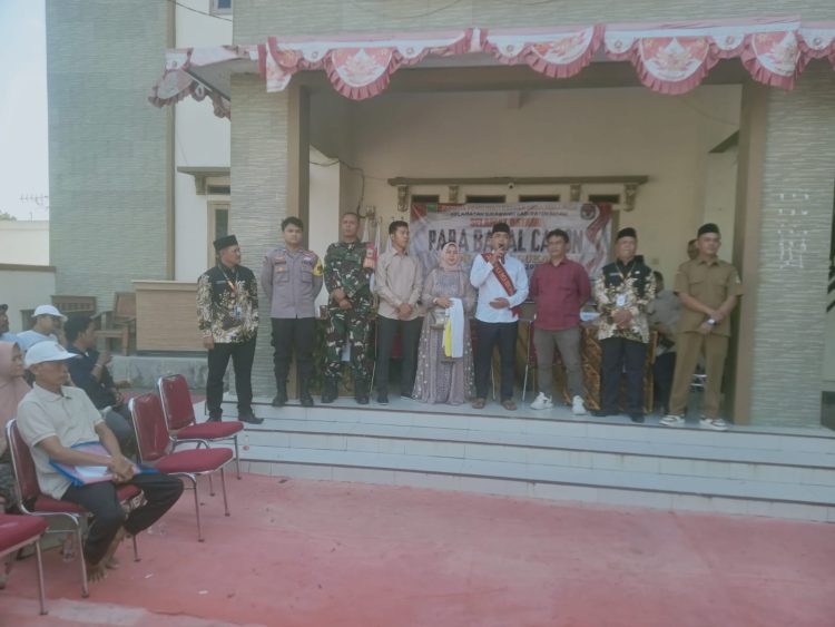 Jaga Jakarta Jaga Bekasi, Bhabinkamtibmas Pantau Pendaftaran Bakal Calon Kepala Desa Sukabudi