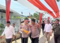 Polres Metro Bekasi Dampingi Penilaian Lomba Gapura HUT RI ke-81 di Karangasatu