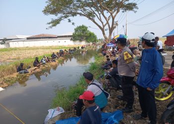 Polsek Pebayuran Amankan Gebyar Mancing, Satu Ton Lele Meriahkan HUT RI ke-81 di Sumbereja