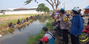 Polsek Pebayuran Amankan Gebyar Mancing, Satu Ton Lele Meriahkan HUT RI ke-81 di Sumbereja