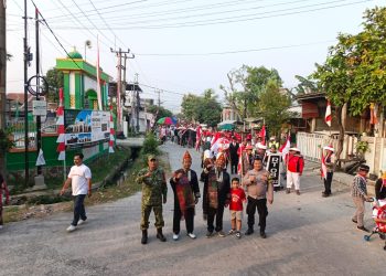 Polsek Babelan Amankan Karnaval dan Jalan Sehat HUT RI ke-81 di Kebalen