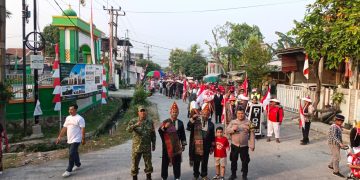 Polsek Babelan Amankan Karnaval dan Jalan Sehat HUT RI ke-81 di Kebalen