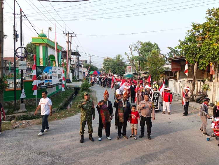 Polsek Babelan Amankan Karnaval dan Jalan Sehat HUT RI ke-81 di Kebalen
