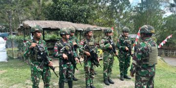 Ukir Senyum Mama-Mama Papua, Satgas Yonif 645/GTY Beli Hasil Bumi di Distrik Kelila