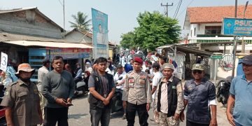 Polsek Pebayuran Amankan Kampanye Terbuka Calon Kades Karangharja Nomor Urut 3