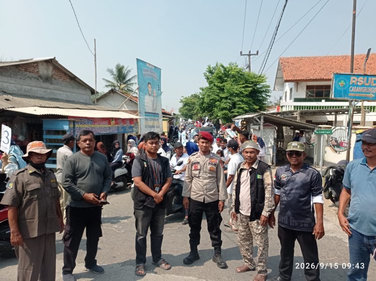 Polsek Pebayuran Amankan Kampanye Terbuka Calon Kades Karangharja Nomor Urut 3